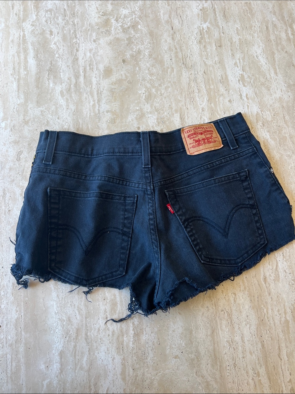Levi's Black Denim Frayed Hem Cutoff Shorts with Brass Details on Pocket